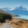 A landscape of Lake Pukaki Pukaki in New Zealand surrounded with snowy mountains
