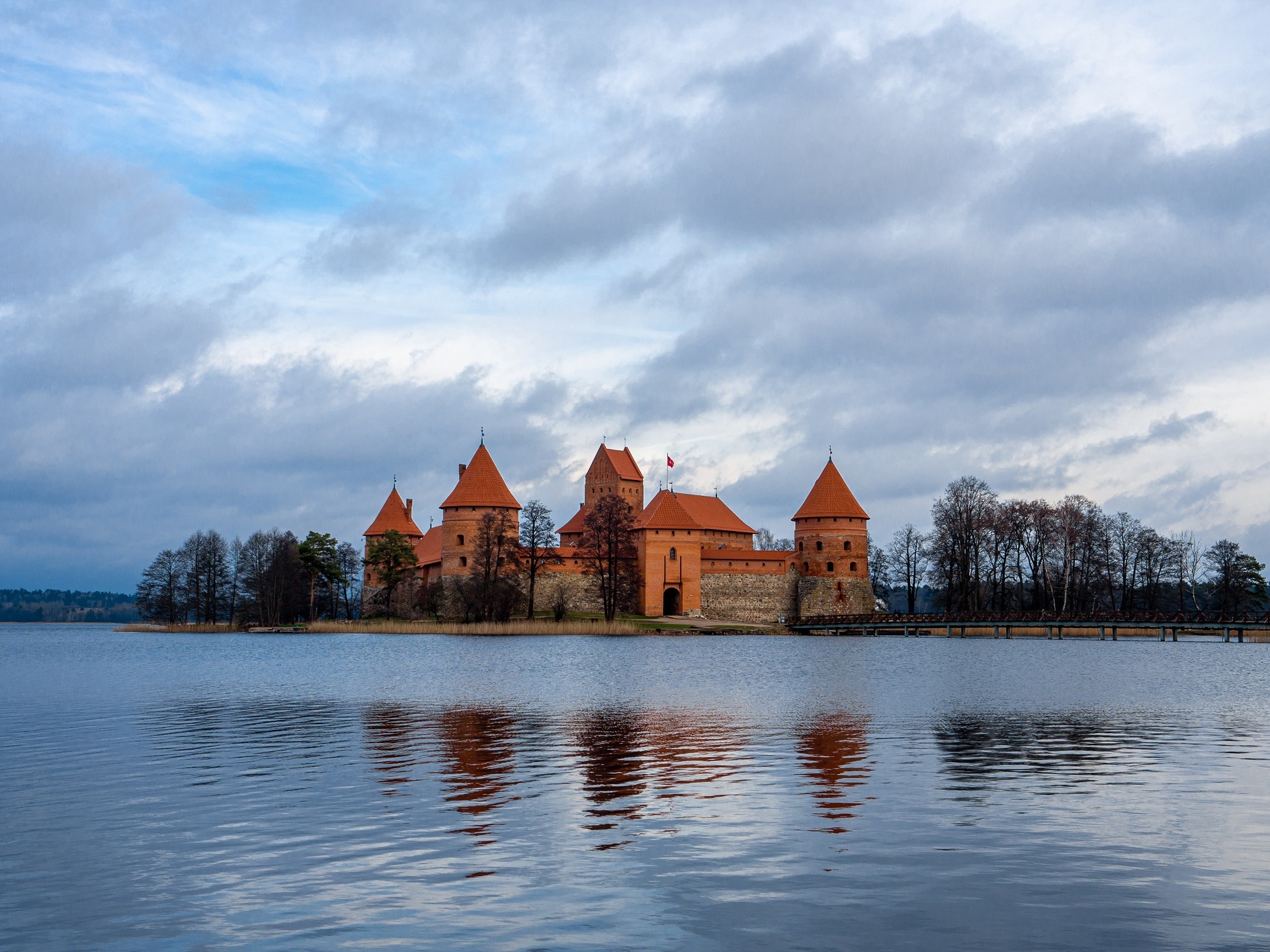 A mesmerizing view of Trakai Island Castle in Trakai, Lithuania surrounded by calm water